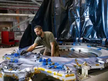Brian Simpson Adjusts Sensors On The Deployable Aperture Cover For Nasa’s Nancy Grace Roman Space Telescope.
